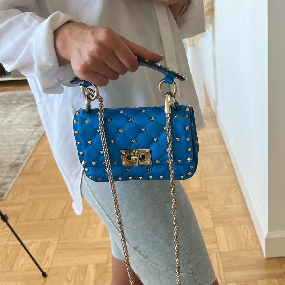 New Valentino small rock stud spike Napa leather bag in blue. With the stain!